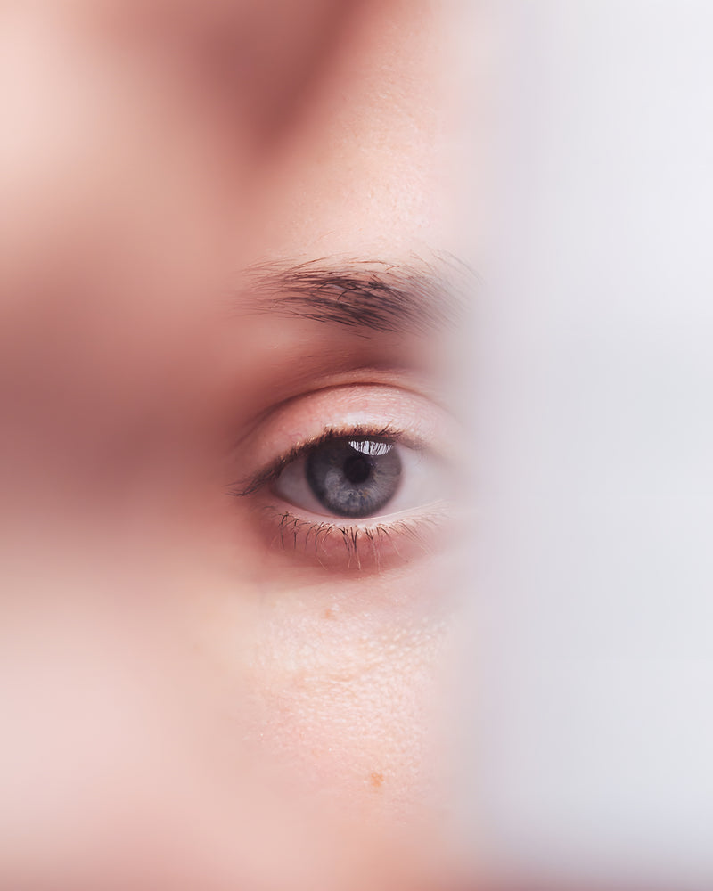 Woman applying Aliangé Rejuvenating Eye & Lip Cream — eye and lip ritual in use