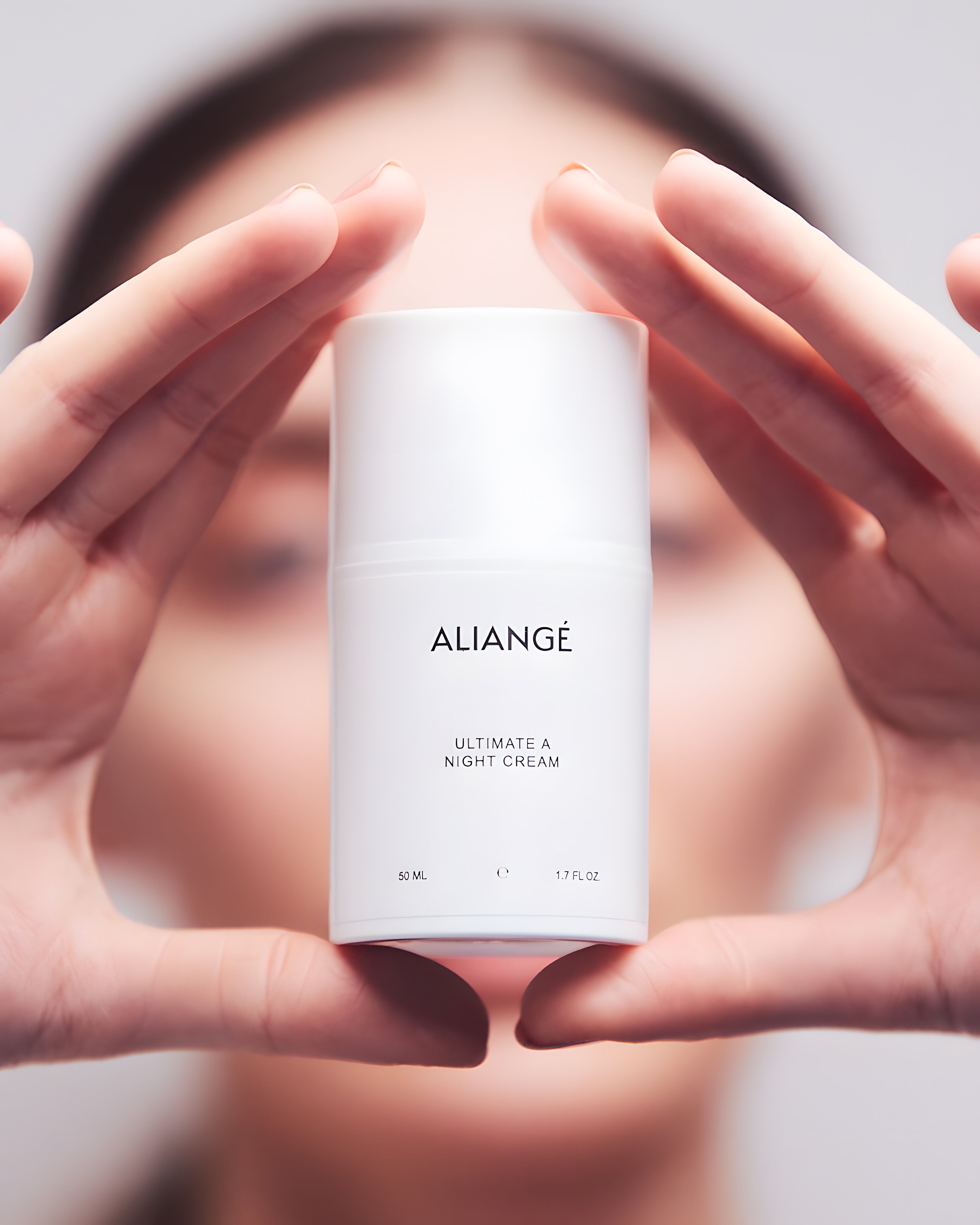 Woman applying Aliangé Ultimate A Night Cream + — retinol bakuchiol night ritual in use